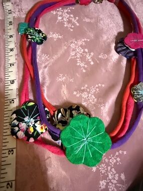 Fabric can created flower necklace in fabric material material